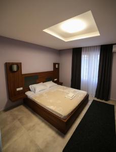 Ένα ή περισσότερα κρεβάτια σε δωμάτιο στο Hotel Centrum