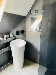 Koupelna v ubytování Zollernalb-Apartment PR