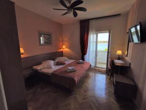 Postel nebo postele na pokoji v ubytování Guest House Palme