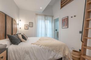 Postel nebo postele na pokoji v ubytování Exclusive Penthouse in PLaza La Merced