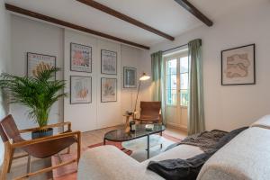 Posezení v ubytování Exclusive Penthouse in PLaza La Merced