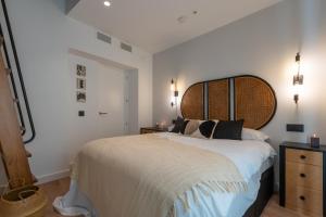 Postel nebo postele na pokoji v ubytování Exclusive Penthouse in PLaza La Merced