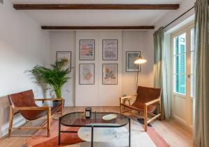 Posezení v ubytování Exclusive Penthouse in PLaza La Merced
