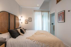 Postel nebo postele na pokoji v ubytování Exclusive Penthouse in PLaza La Merced