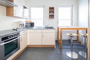 Dapur atau dapur kecil di Westwind im Haus Portscher +12 gambar