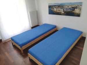 A bed or beds in a room at CASA CRISTINA Monopoli