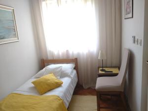 Postel nebo postele na pokoji v ubytování Guest House Palme