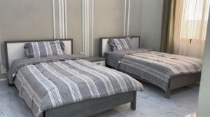 Postel nebo postele na pokoji v ubytování Al Jabal Resort Villa 2