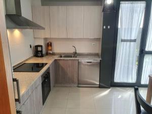 A kitchen or kitchenette at Coco Pardal, Pontevedra