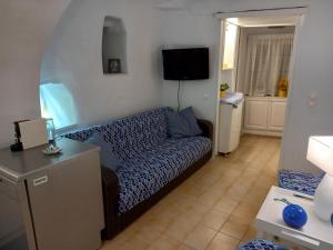 Кровать или кровати в номере Anthie's shore house
