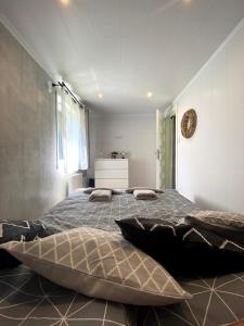 Postel nebo postele na pokoji v ubytování Tiny house