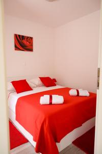 Postel nebo postele na pokoji v ubytování Apartments Silva