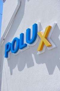 a sign for the polish gas company polut on a building at PoluX in Vama Veche