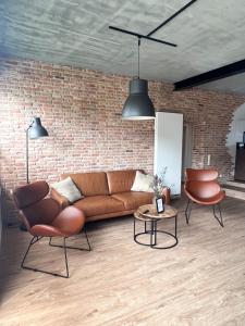 Posezení v ubytování Dyke Appartements