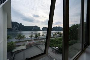 a view of a river from a window at LUXURY HOTEL in Ha Long