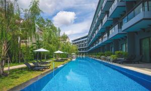 Bazén v ubytování Centara Life Cha-Am Beach Resort Hua Hin nebo v jeho okolí