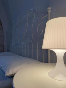 A bed or beds in a room at Maison Anthea