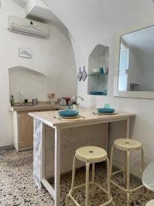 A kitchen or kitchenette at Maison Anthea