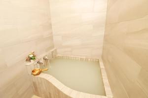 Vannituba majutusasutuses Gorgeous Hot Spring Resort