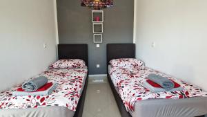 Postel nebo postele na pokoji v ubytování Apartments Pinezić