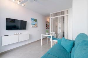 Telewizja i/lub zestaw kina domowego w obiekcie LA SIESTA APARTMENT