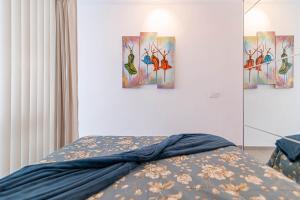 Łóżko lub łóżka w pokoju w obiekcie LA SIESTA APARTMENT