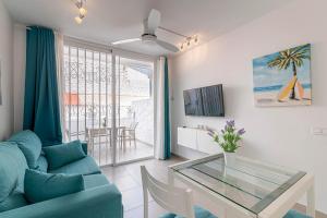 Telewizja i/lub zestaw kina domowego w obiekcie LA SIESTA APARTMENT