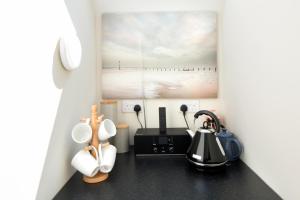 Kuhinja ili čajna kuhinja u objektu Sallins Loft