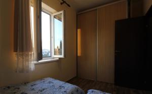 Postel nebo postele na pokoji v ubytování Apart hotel St.Pijerre