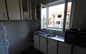 Kuchyň nebo kuchyňský kout v ubytování Apart hotel St.Pijerre