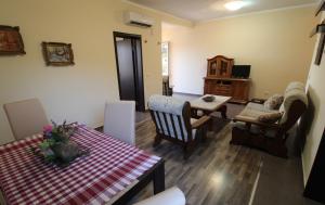 TV a/nebo společenská místnost v ubytování Apart hotel St.Pijerre