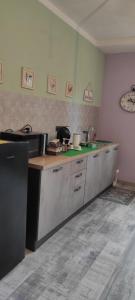 Kuchyňa alebo kuchynka v ubytovaní B&B Cascina Grattinera
