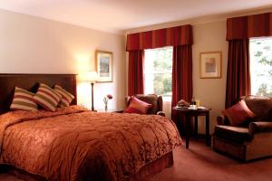 Tempat tidur dalam kamar di Macdonald Norwood Hall Hotel