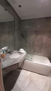 Et badeværelse på Apartamento muy acogedor , en el casco antiguo. + 12 billeder