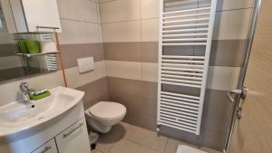 Kúpeľňa v ubytovaní Apartment PIPO