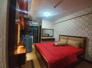 Фотография из галереи OYO 91338 Apartment Bekasi Town Square в городе Бекаси +29 фотографий