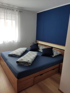 Ένα ή περισσότερα κρεβάτια σε δωμάτιο στο Apartment Ana