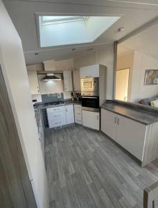 Η κουζίνα ή μικρή κουζίνα στο C05 - The Ogwen Lodge with Hot Tub +8 φωτογραφίες