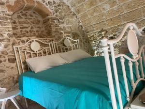 Postel nebo postele na pokoji v ubytování Pietrabianca Suite