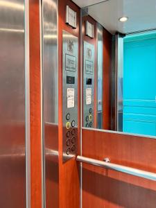 a row of elevators in a subway train at Appart Hypercentre - Le Clemenceau in Bordeaux