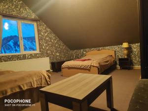 Voodi või voodid majutusasutuse Green Hostel toas