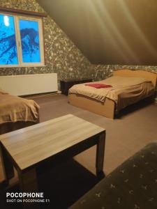 Ένα ή περισσότερα κρεβάτια σε δωμάτιο στο Green Hostel