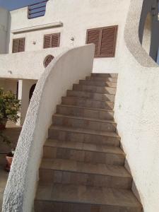 a stairway leading up to a building at Villa Anna Maria in Polignano a Mare