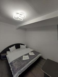 Katil atau katil-katil dalam bilik di Cazare La Maria