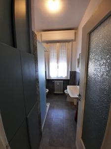 Łóżko lub łóżka w pokoju w obiekcie La Casa di Amelie