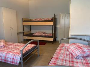 Postel nebo postele na pokoji v ubytování Ferienwohnung bis 8 Personen