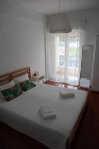 Postel nebo postele na pokoji v ubytování Ana's Guesthouse