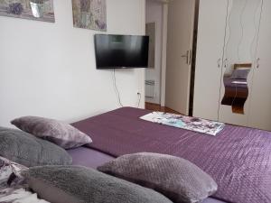 Postel nebo postele na pokoji v ubytování Apartments Anita