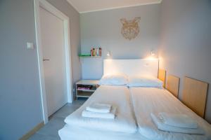 Posteľ alebo postele v izbe v ubytovaní Apartament dla aktywnych (z pięknym widokiem)