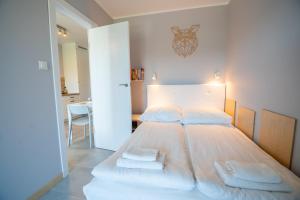 Posteľ alebo postele v izbe v ubytovaní Apartament dla aktywnych (z pięknym widokiem)